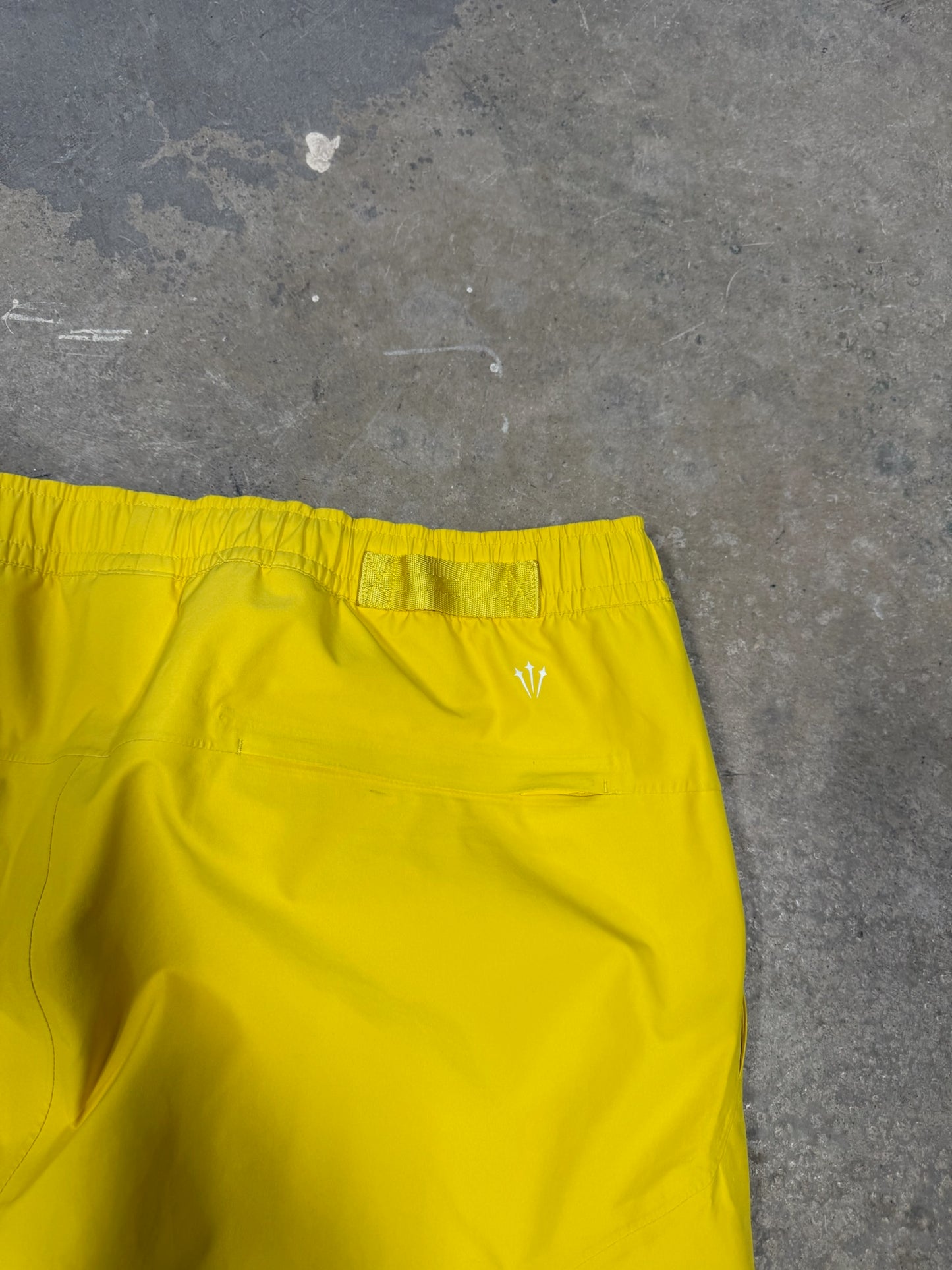 (XL) Nike x NOCTA L'Art Tech Pant Yellow