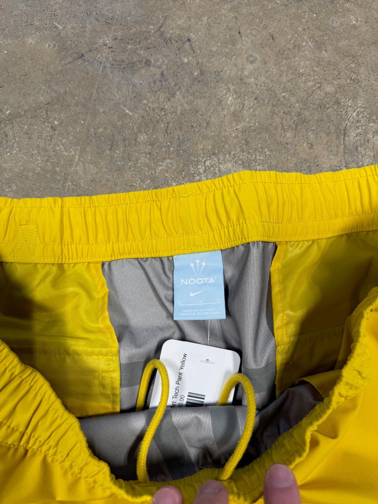 (XL) Nike x NOCTA L'Art Tech Pant Yellow